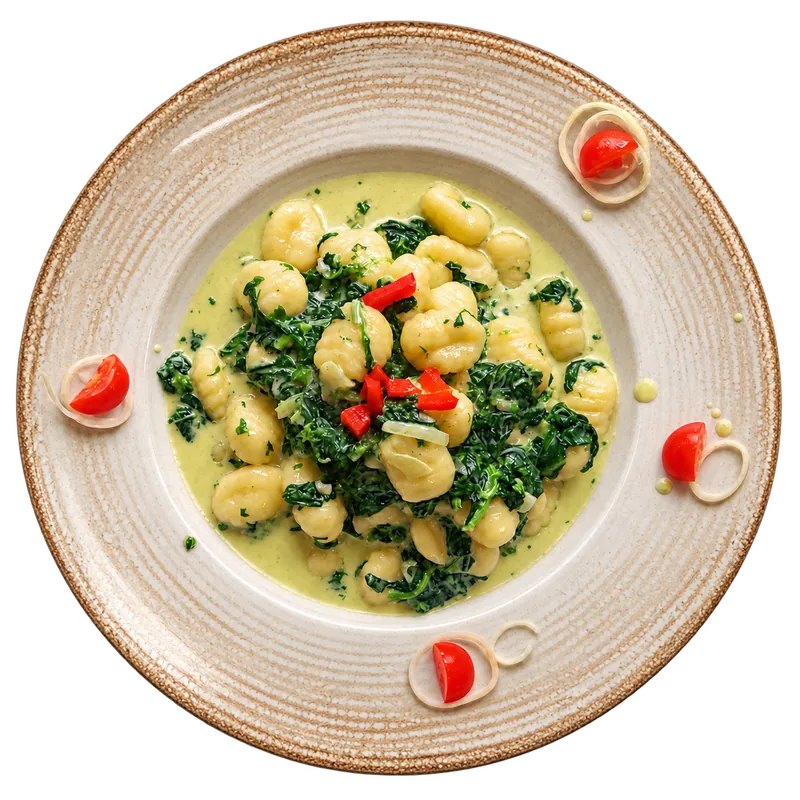Gnocchi an Spinat-Rahmsauce im Restaurant Zur Traube